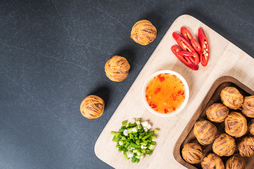 Deep Fried Wrapped Pork with Chinee Noodle Traditional Thai food. Thai traditional snacks menu (Thai name is Noo sarong)