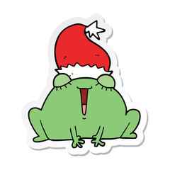 sticker of a cute cartoon christmas frog