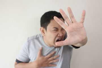 Crying Sad Young Man Showing Surrender Gesture