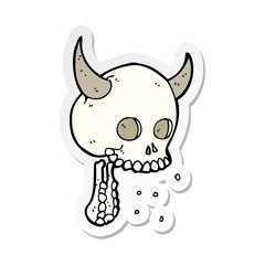 sticker of a cartoon spooky skull