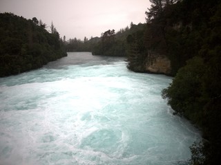 Bright blue runoff water from cascade waterfall in north island of New Zealand