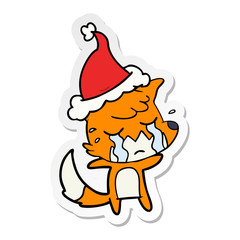 crying fox sticker cartoon of a wearing santa hat