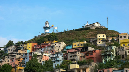colorful cerro santa ana and lighthouse in guayquil, ecuador
