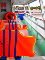 colorful of life vest on the boat