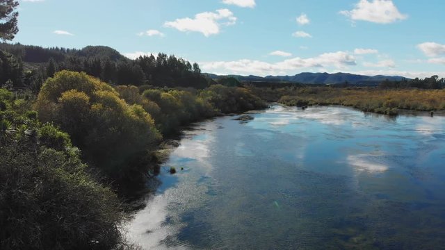 Scenic aerial landscape shot of pristine lake in New Zealand