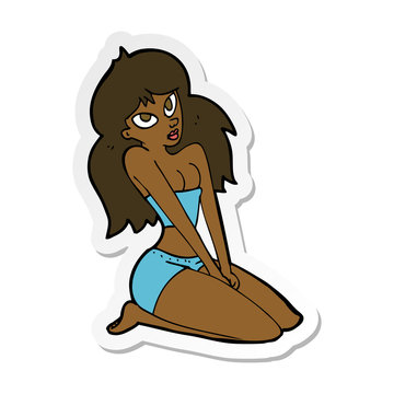 sticker of a cartoon woman in skimpy clothing