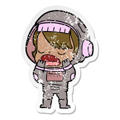 distressed sticker of a cartoon talking astronaut yawning
