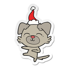 sticker cartoon of a dog kicking wearing santa hat