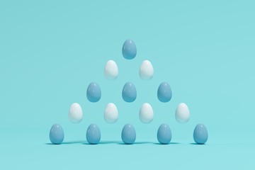 Blue and white eggs floating in triangle shape on blue background. Minimal Easter idea.