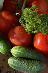 Juicy red tomatoes with parsley and sliced bacon - healthy and high-calorie food for muzhchiny