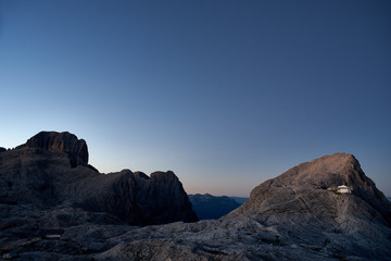 Rosetta peak with moon at sunrise, Pale di San Martino, Primiero, Italy