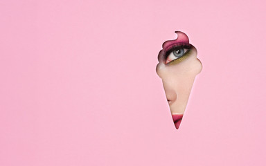 The Face of the Young Beautiful Woman with Bright Pink Shadows and Expressive Eyelashes Looks in...