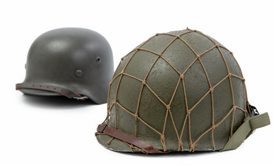 U.S and German World War Two military helmets, battle of Normandy 1944