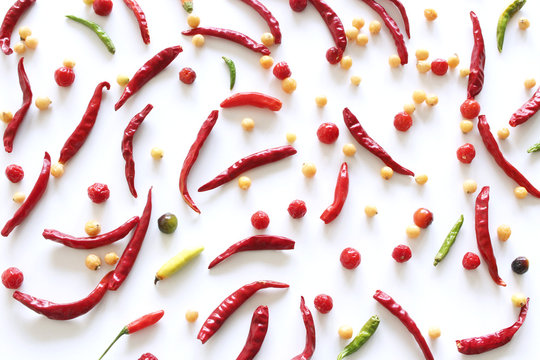 Red pepper chili pattern on white background isolation.Poinsettia Capsicum annuum,Perola Laranja and Mata Grade Capsicum chinense. Food concept.