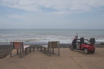 View of Batumi Boulevard. Electric tricycle scooters and Bicycle for rent on Batumi New Boulevard
