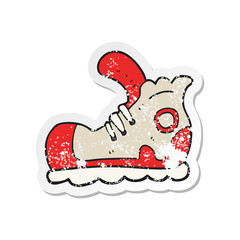 retro distressed sticker of a cartoon sneaker