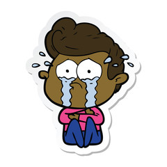 sticker of a cartoon crying man