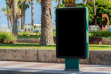 Outdoor billboard advertisement in seaside resort city mockup © sdecoret