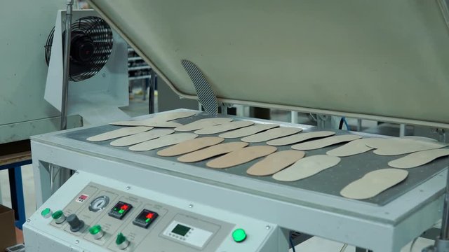 production of insoles for footwear, the device for heating of Shoe insoles