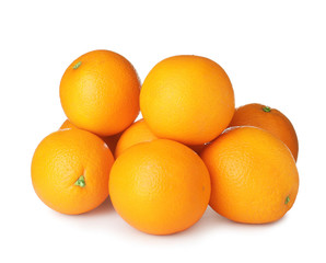 Pile of ripe oranges isolated on white