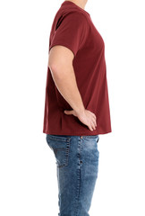 Young man on white background, closeup. Weight loss