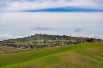 Fototapeta na wymiar The Val d'Orcia in Tuscany Italy with the medieval village of Pienza