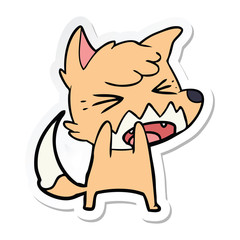 sticker of a angry cartoon fox