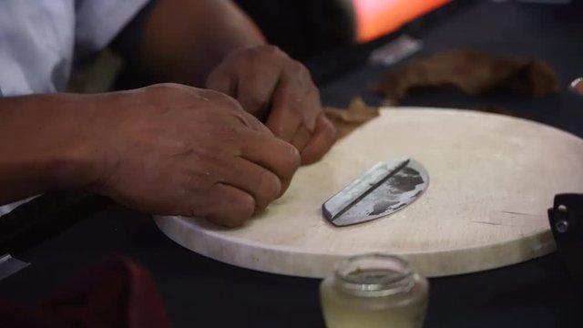 Hand Rolling a Cigar at event