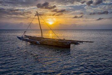 Boat of a fisherman on a tropical beach, Zanzibar, Tanzania