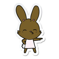 sticker of a curious bunny cartoon