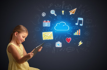 Adorable girl working on tablet with application and gadgets concept
