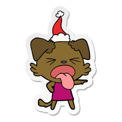 sticker cartoon of a disgusted dog wearing santa hat