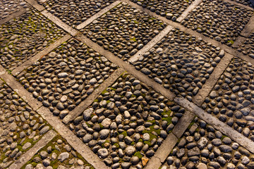 Italy, Bellagio, Lake Como, square cobble stone pattern