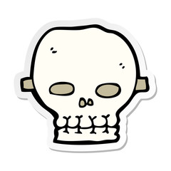 sticker of a cartoon spooky skull mask