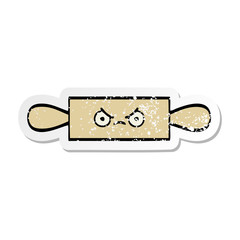 distressed sticker of a cute cartoon rolling pin