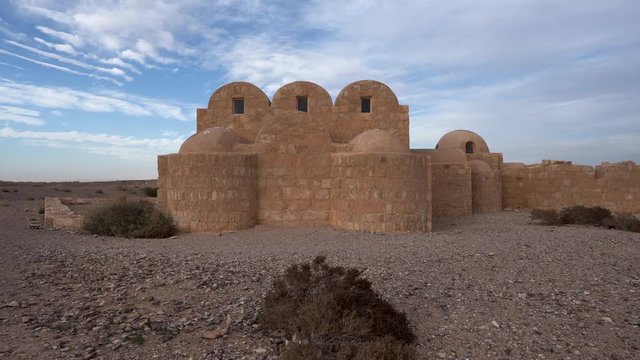 Push In Shot of UNESCO World Heritage Site Qasr Amra Desert Castle with Three Domes and Bath Complex