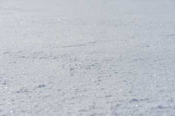 Natural winter background with snow drifts in christmas. sun.