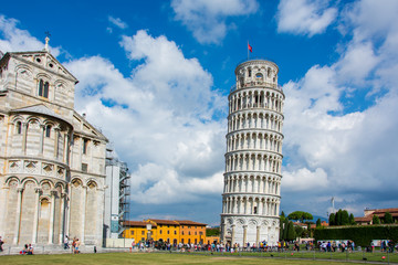 The Leaning Tower of Pisa, Italy, with the dramatic sky. The tower, located on Piazza dei Miracoli...