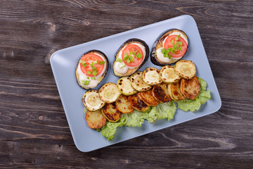 fried and fresh vegetables on a plate