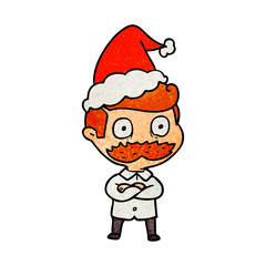textured cartoon of a man with mustache shocked wearing santa hat