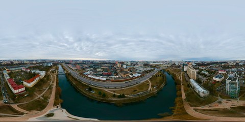 Fototapeta na wymiar Aerial view of Minsk, Belarus near Oktyabrskaya street and Svisloch river