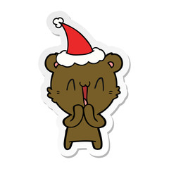 happy bear sticker cartoon of a wearing santa hat