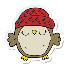 sticker of a cute cartoon owl in hat