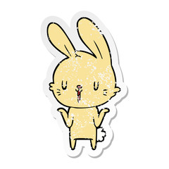 distressed sticker of a cute cartoon rabbit