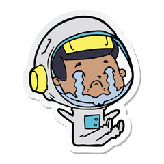sticker of a cartoon crying astronaut