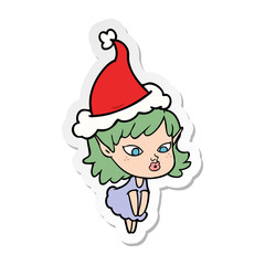 pretty sticker cartoon of a elf girl wearing santa hat