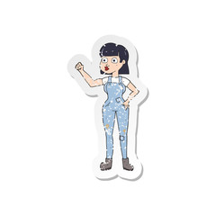 retro distressed sticker of a cartoon woman clenching fist