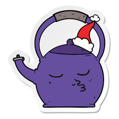 sticker cartoon of a kettle wearing santa hat