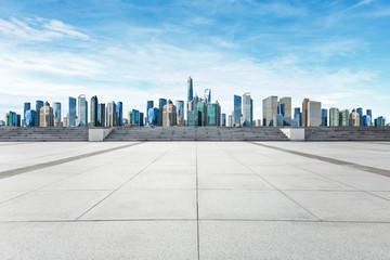 Empty square floor and panoramic city skyline with buildings in Shanghai