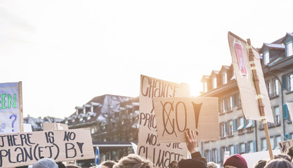 Group of demonstrators fight for climate change - Focus on center banners